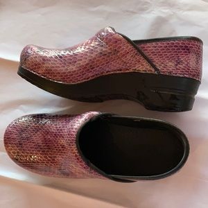 Ladies size 38 Sanita Clogs. Multiple shades of purple and lavender.